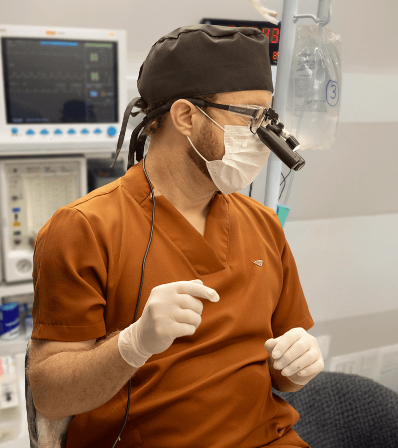Dr. Baltazar Sanabria preparing for hair transplant surgery at Sanabria Clinic