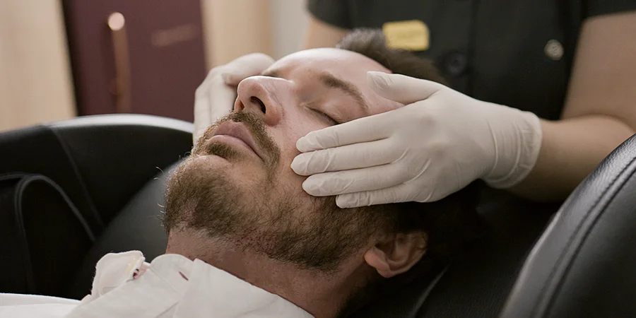 Post-procedure scalp massage after High-Count No-Shave FUE treatment